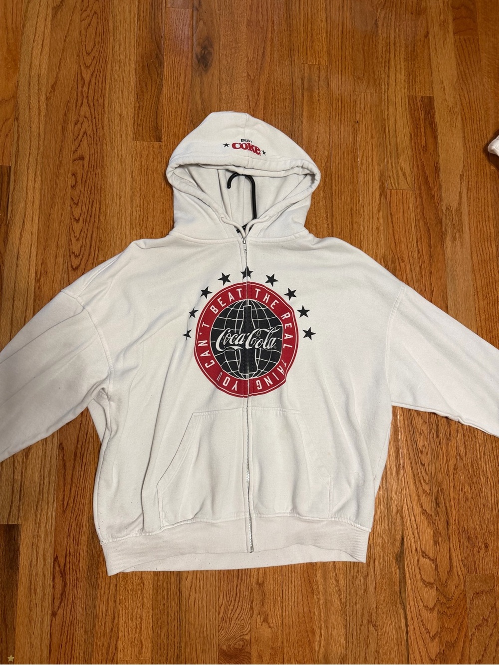 H&M White Zip-Up Hoodie with Red and Black Coca-Cola Graphic